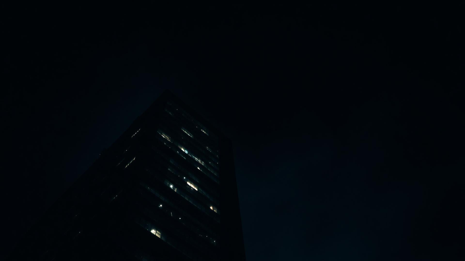 Modern office tower at dusk